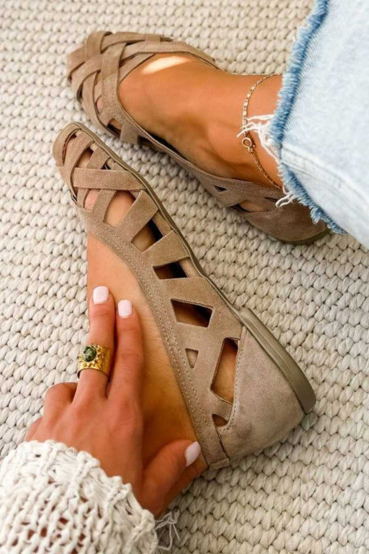 Hina | Platta sandaler med öppen tå och flätat material